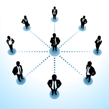 Image of a person surrounded by other people standing in a circle